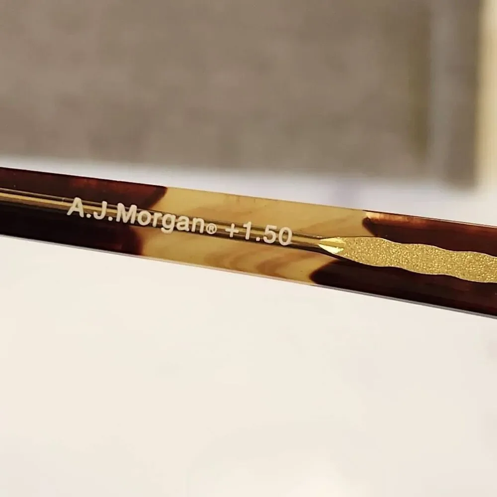 A.J. Morgan reading eyeglasses 1.50 striped impression white brown peepers tort